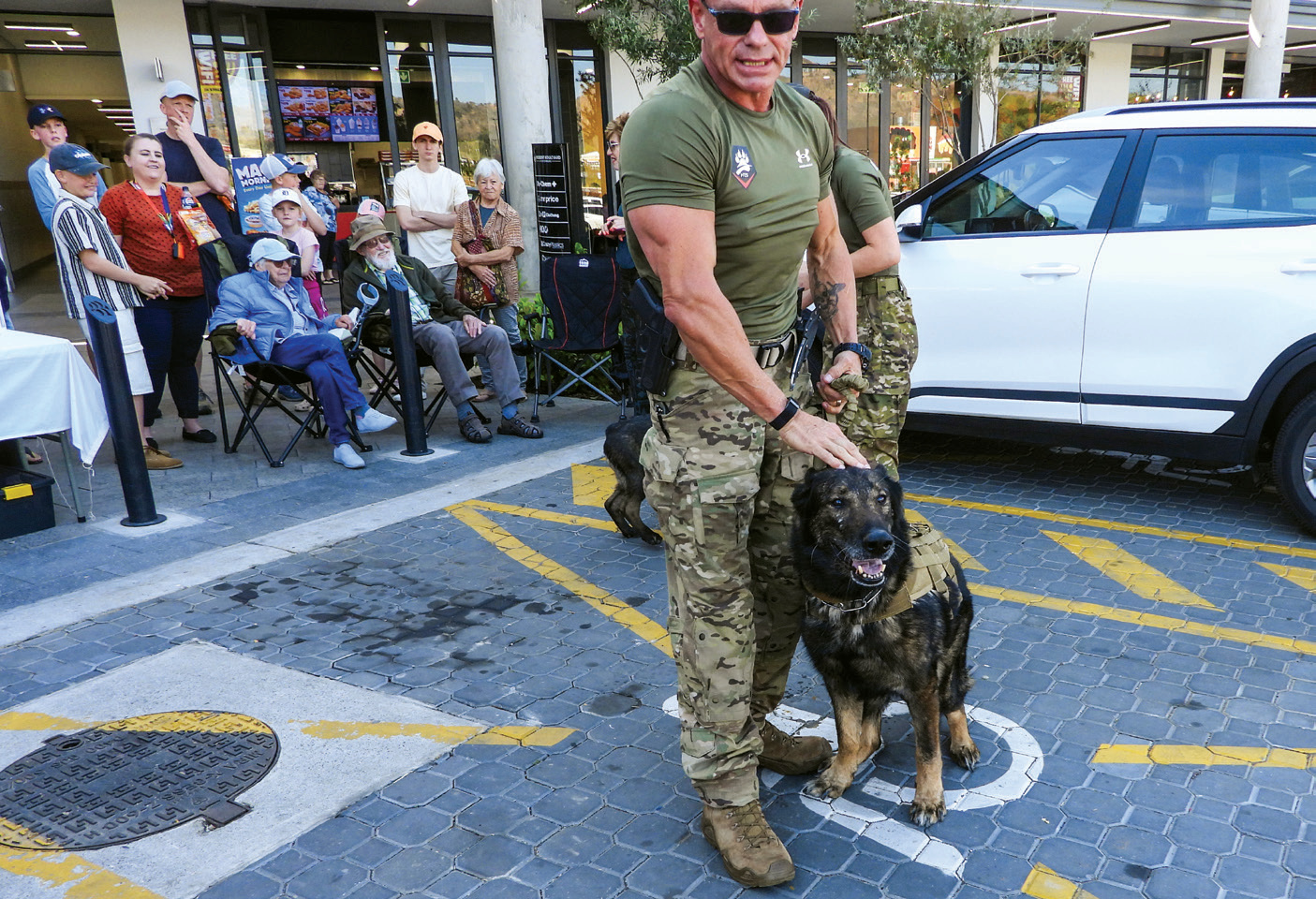 A LEGEND AND HIS BEST FRIEND | HenCor Tactical Solutions owner Henry Holsthyzen with 16-year-old Arrow, the remarkable DDR German Shepherd who remains strong and deeply loved.